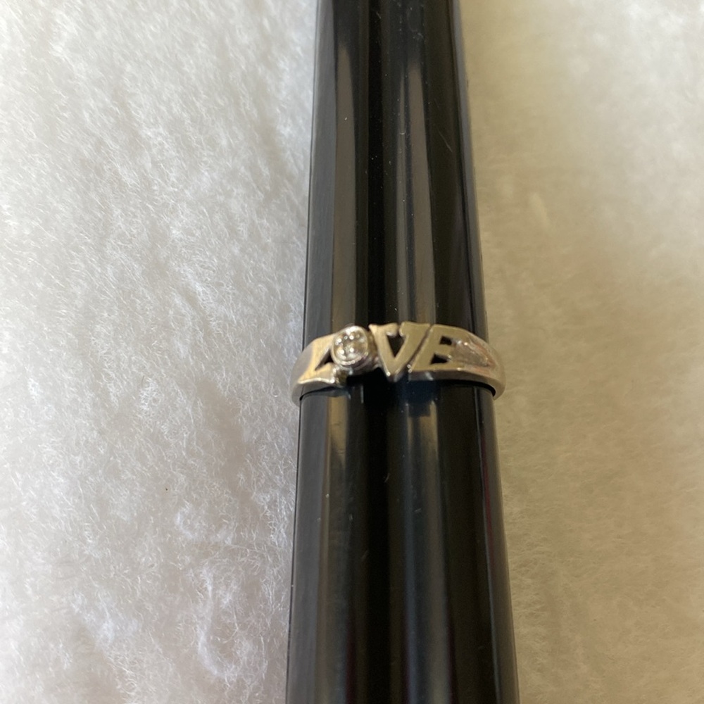 Vintage 1970s silver "LOVE" ring with diamond chip